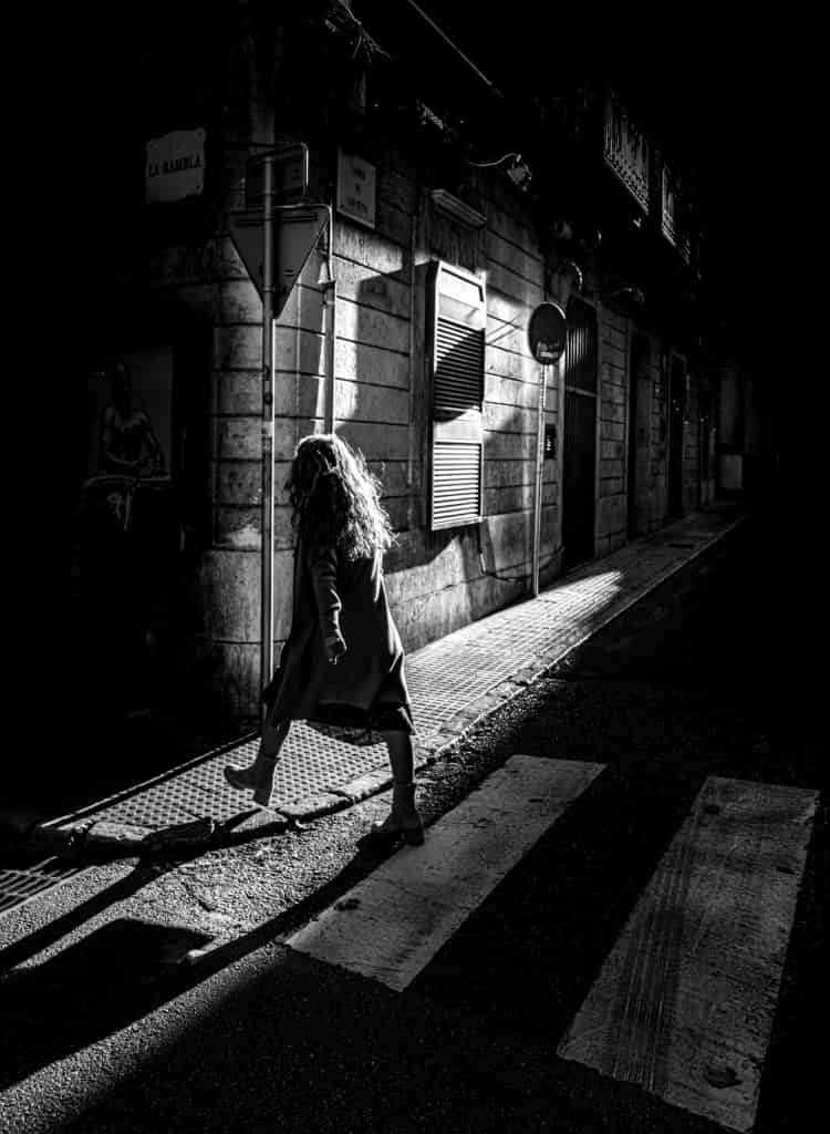 last light on la rambla - lone figure walking through golden evening light in palma
